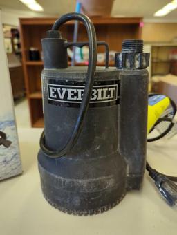 Everbilt 1/6 HP Plastic Submersible Utility Pump. Comes in open box as is shown in photos. Appears
