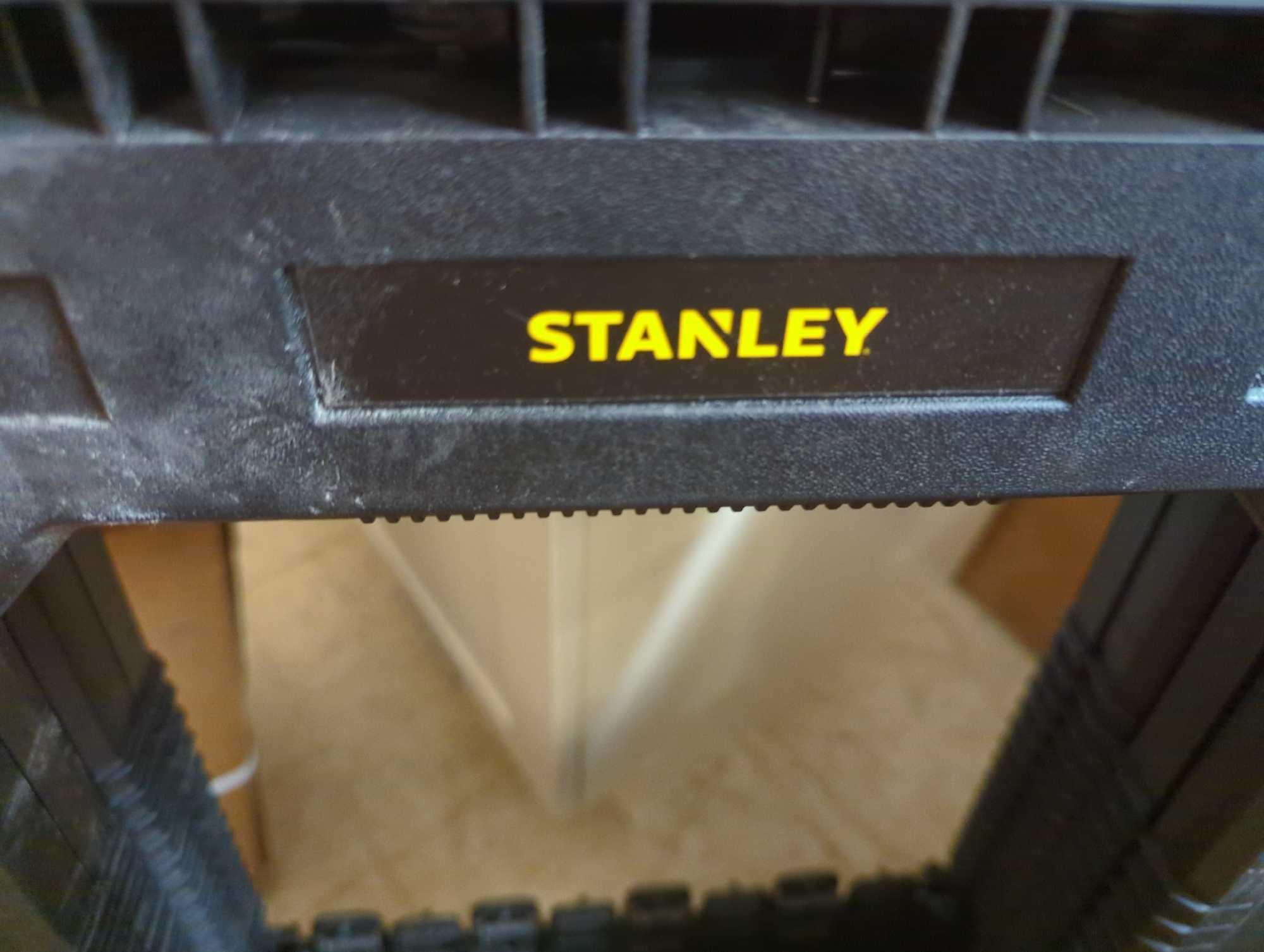 Stanley 31 in. H Plastic Folding Sawhorse (2 Pack), Appears to be Used Has some Marks on them,