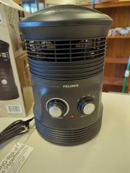 Pelonis 1500-Watt 360... Surround Fan Heater. Comes as is shown in photos. Appears to be new. SKU #