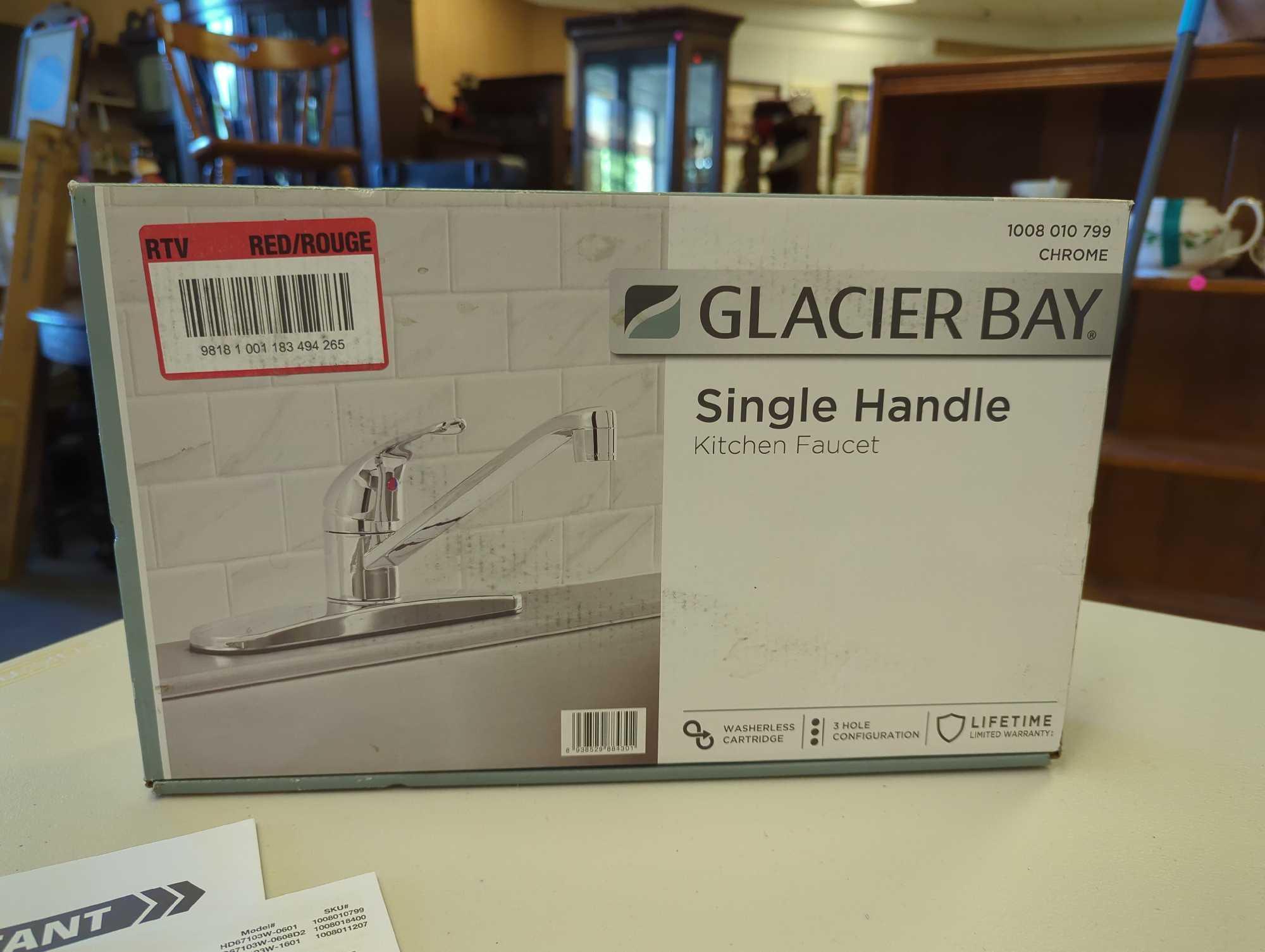 Glacier Bay Single Handle Standard Kitchen Faucet in Polished Chrome. Comes as is shown in photos.