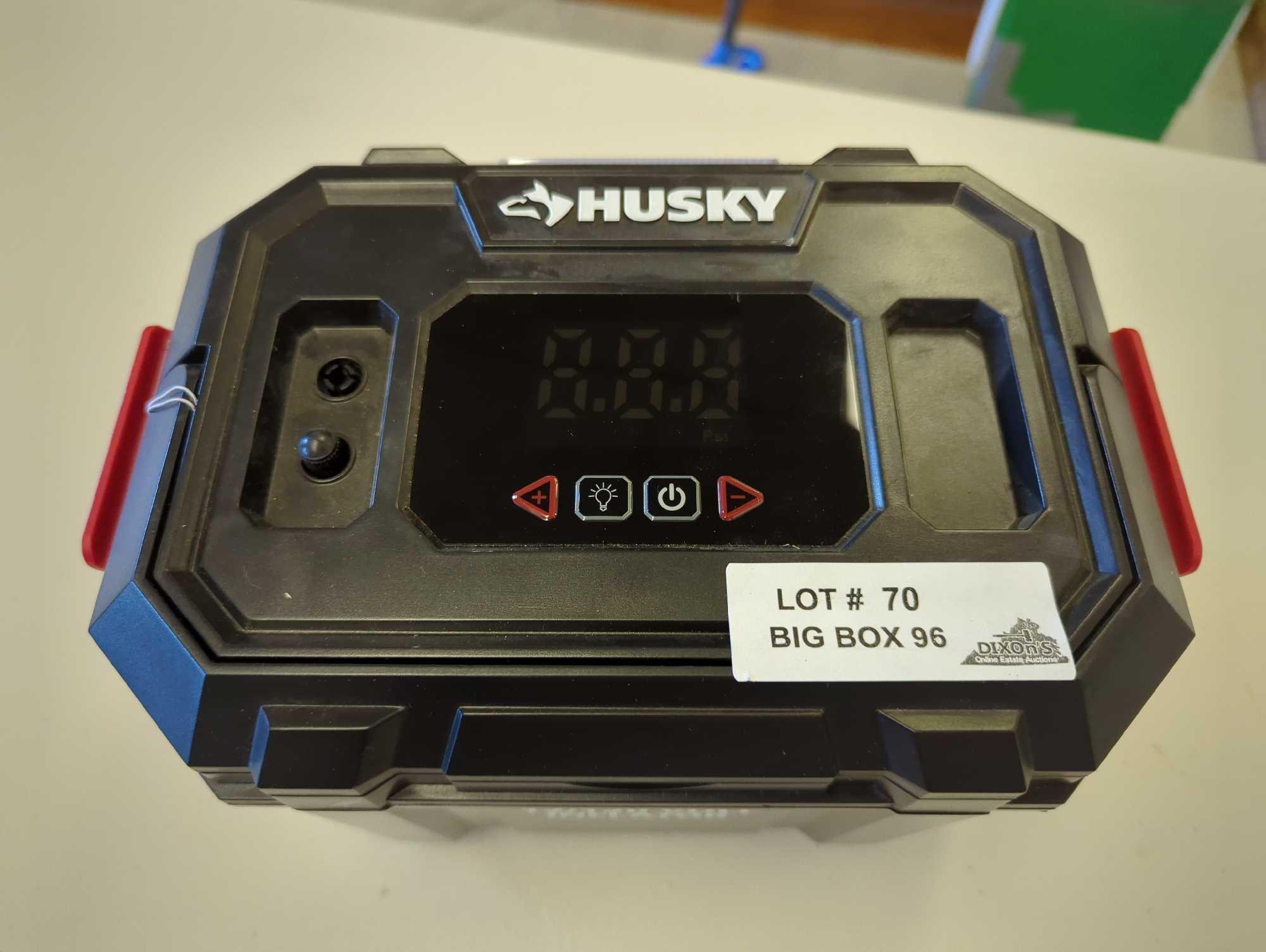 Husky 12-Volt/120-Volt Home & Auto Tire Inflator. Comes as is shown in photos. Appears to be new.