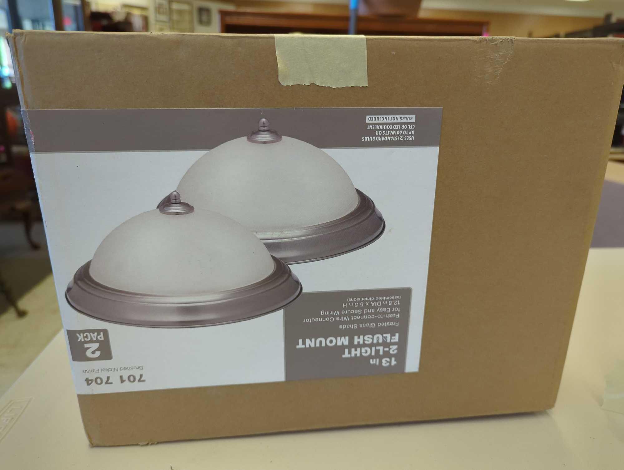 13 in. 2-Light Brushed Nickel Flush Mount (2-Pack). Comes as is shown in photos. Appears to be new.