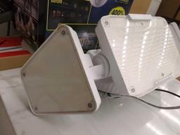 BEYOND BRIGHT Hardwired Black Motion Sensing LED Landscape Flood Light. Comes in open box as is