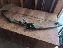 (GAR) PSE PRO LINE CAMO COMPOUND BOW. USED CONDITION.