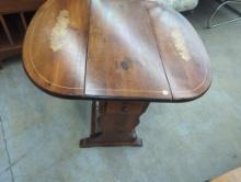 Drop-Leaf Wooden Table with Floral Motif