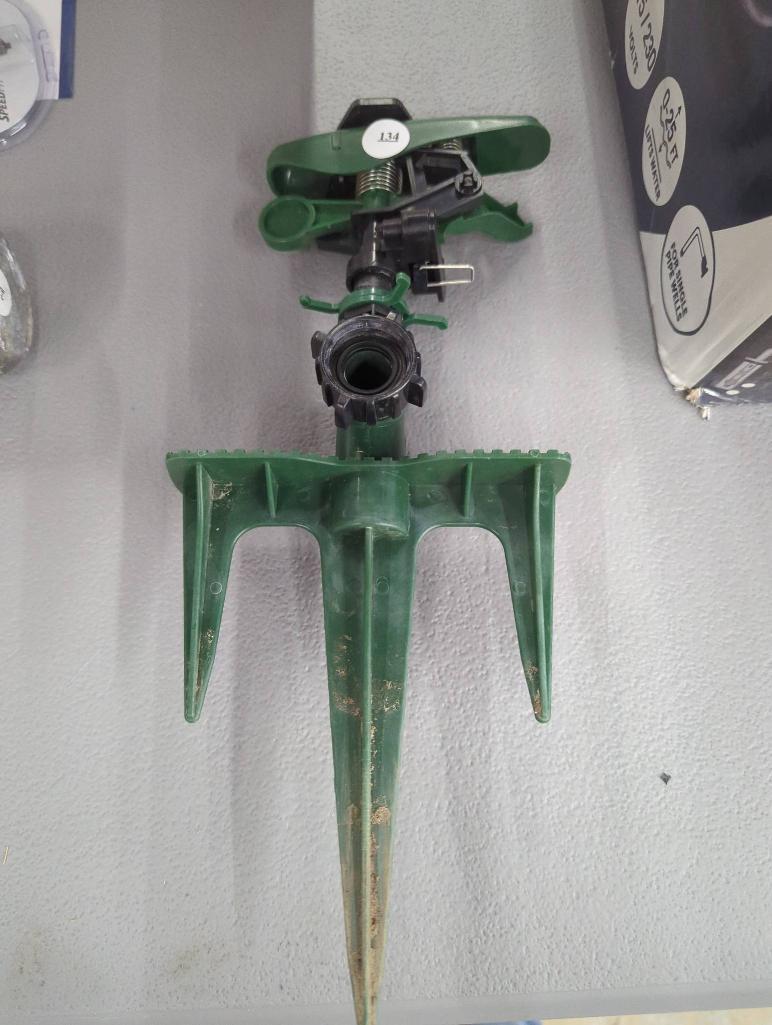 Green Garden Sprinkler with Ground Spike
