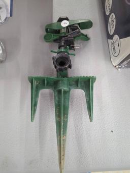 Green Garden Sprinkler with Ground Spike