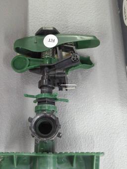 Green Garden Sprinkler with Ground Spike