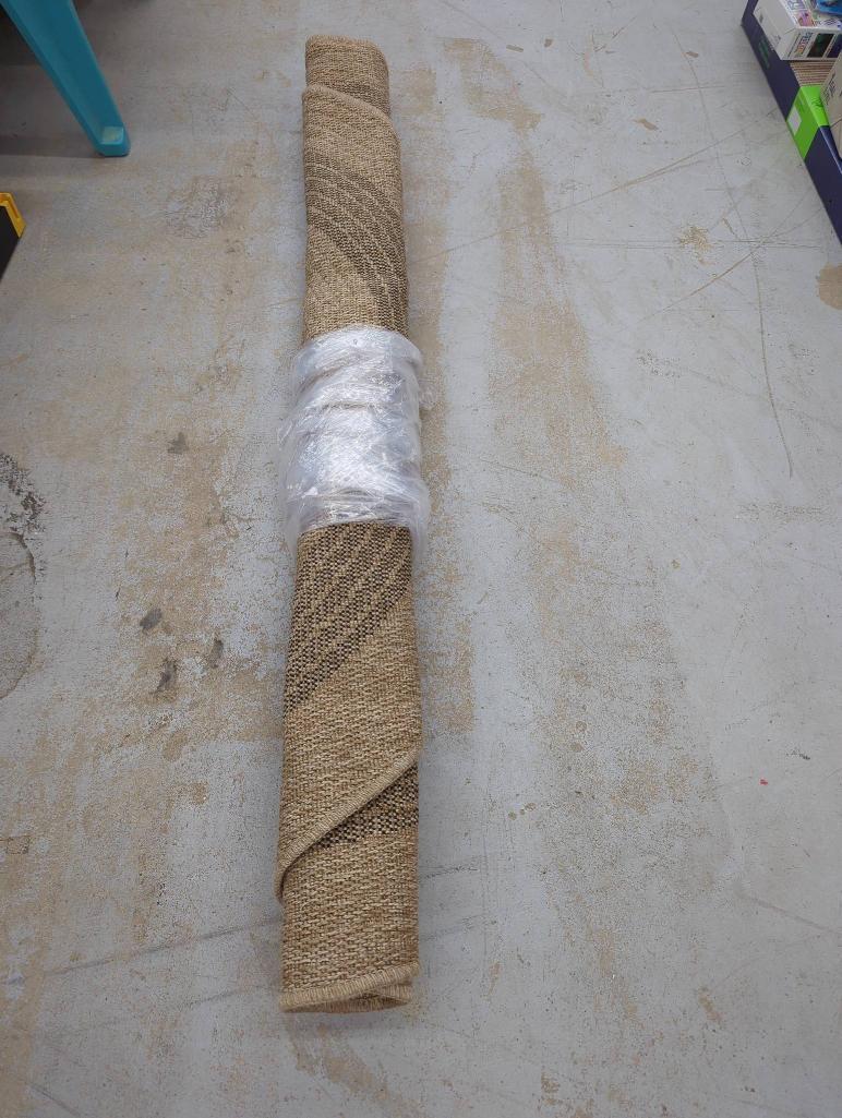 Rolled Woven Area Rug in Neutral Tones