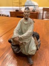 8-Inch Porcelain Figurine of Seated Man in Robes