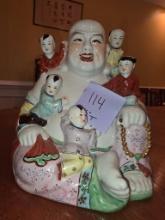 Porcelain Laughing Buddha Figurine with Children Motif