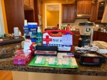 Miscellaneous Items Including First Aid Kit, Lantern, and Office Supplies