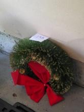 Decorative Green Wreath With Red Bow and Gold Accents