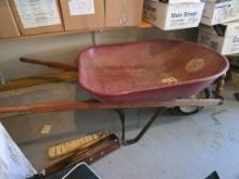 Red Poly Wheelbarrow with Metal Frame and Wooden Handles