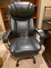 Executive Black Leather Office Chair with Adjustable Features