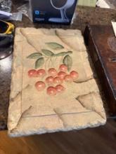 Two Items: Stone-Like Plaque with Cherry Design and Leather-Bound Journal