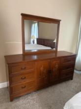 Wooden Dresser with Mirror and Carved Center Cabinet