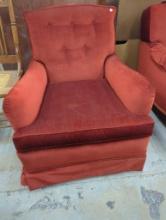 Red Upholstered Armchair with Skirted Base, Measures 27x21x31 Inches