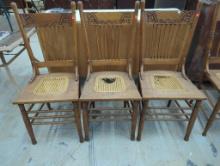 3 Wooden Chairs With Caned Seats and Carved Backs