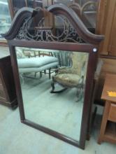 Ornate Wood-Framed Wall Mirror with Scrolled Top, 35 x 50 Inches