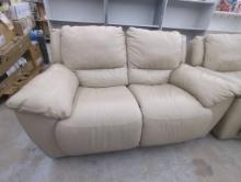 Beige Leather Reclining Loveseat with Manual Mechanism