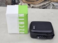 Ozchin Lockable Storage Case in Black Carbon Finish with Opened Box