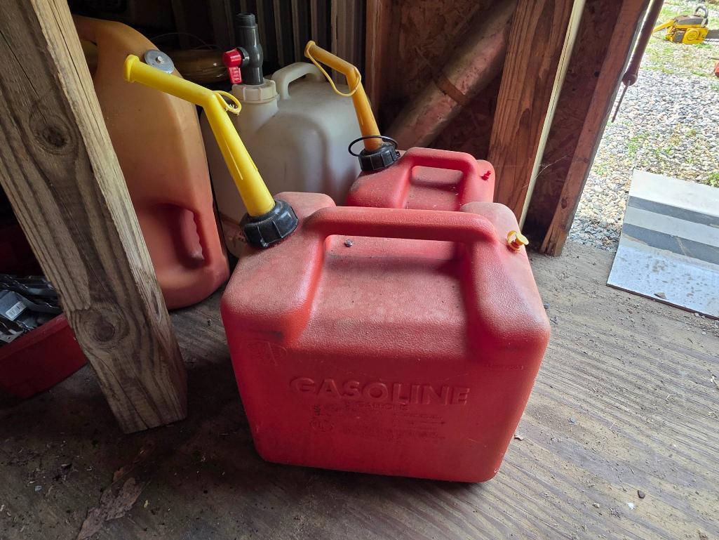 PowerCraft Equipment, Cables, Gas Cans, and Miscellaneous Contents Under Table