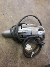 Electric Handheld Power Tool with Metal Housing and Attached Cord
