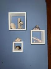 Floating Shelves with Contents Including Ceramic and Shell Decor,