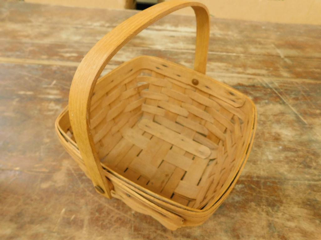 Pair of Handled Longaberger Baskets - 4.5" x 14" x 10" and 5" x 9" x 9"