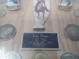 FRAMED COLLECTION OF JOHN WAYNE KNIVES & COINS