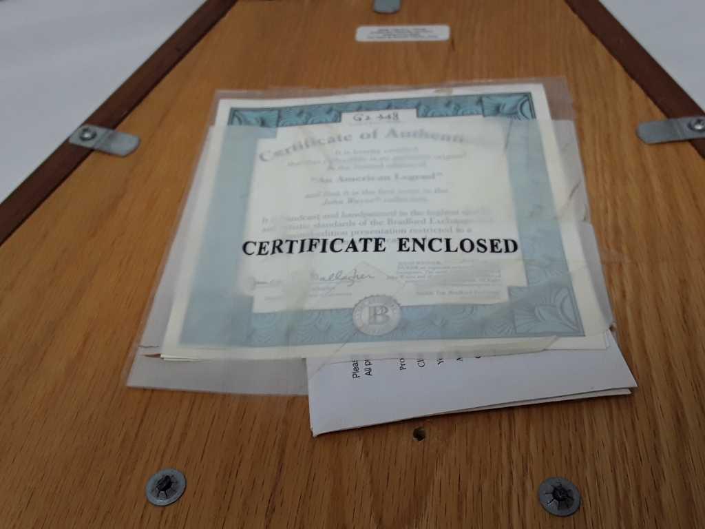 FRAMED COLLECTION OF JOHN WAYNE KNIVES & COINS