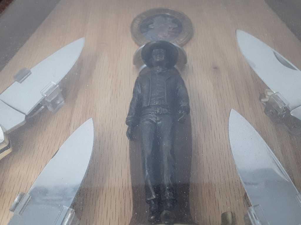 FRAMED COLLECTION OF JOHN WAYNE KNIVES & COINS