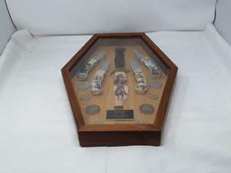 FRAMED COLLECTION OF JOHN WAYNE KNIVES & COINS