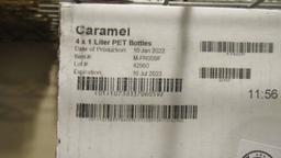 8) BOTTLES OF MONIN CARAMEL GOURMET SYRUP.
