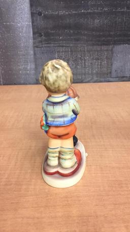 M.I. HUMMEL FIGURINE "BEGGING HIS SHARE"