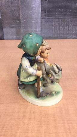 M.I. HUMMEL FIGURINE "HOMEWARD BOUND"