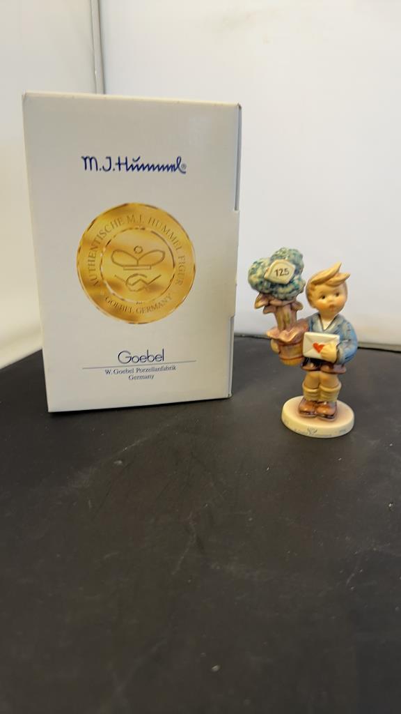 M.I. HUMMEL FIGURINE "GOOD NEW" GOEBEL 125YR ANN