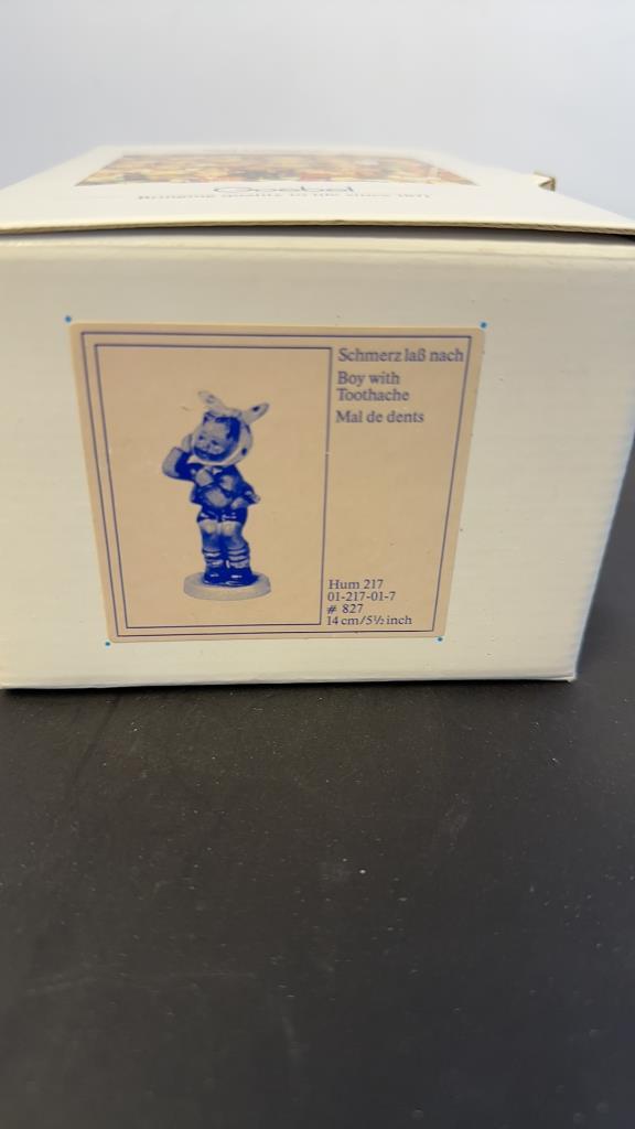 M.I. HUMMEL FIGURINE "BOY WITH TOOTHACHE"