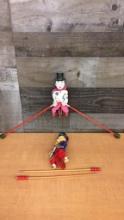 VINTAGE TIGHTROPE BALANCING CLOWNS