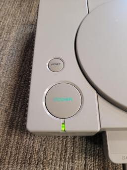 PLAYSTATION 1 CONSOLE, CONTROLLERS, & GAMES