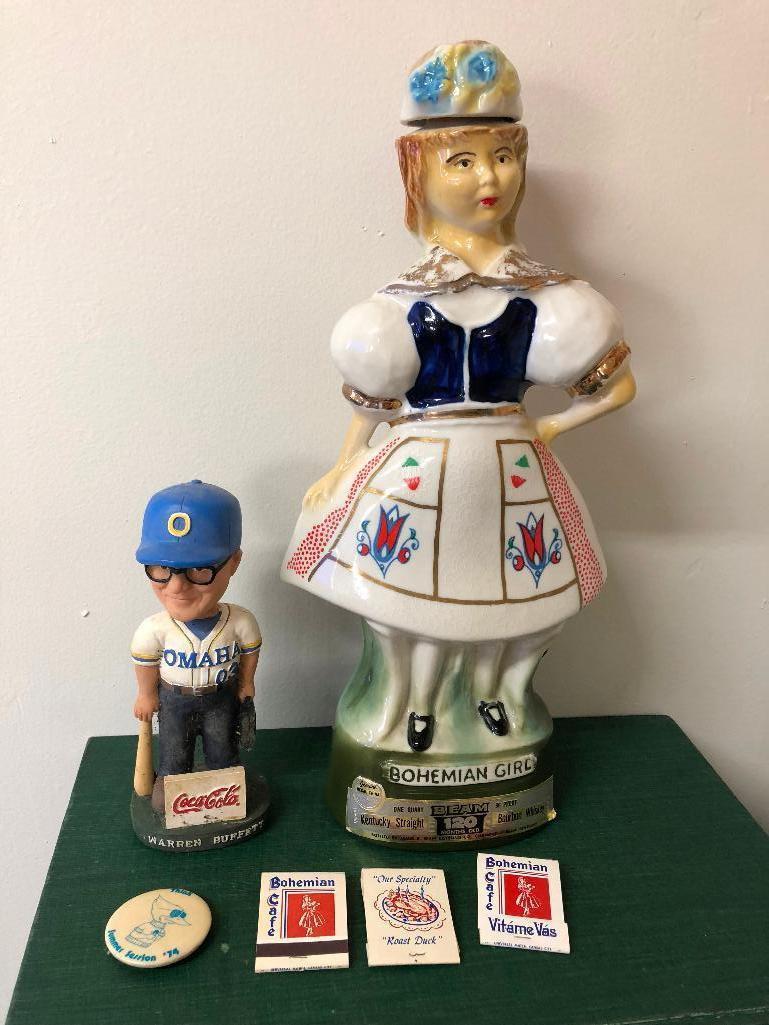 Omaha Lot: Bohemian Cafe Bohemia Girl Decanter, 3 Match Books & Warren Buffet Bobble Head