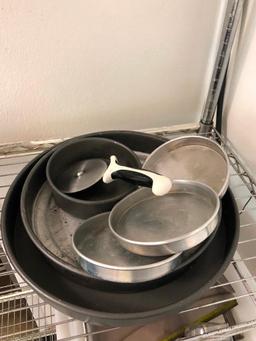 Group of Deep Dish Pizza Pans and Pizza Cutters