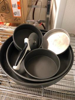 Group of Deep Dish Pizza Pans and Pizza Cutters