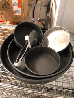 Group of Deep Dish Pizza Pans and Pizza Cutters