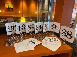 Group of Table Marker Clip Stands and Table Number Laminate Cards