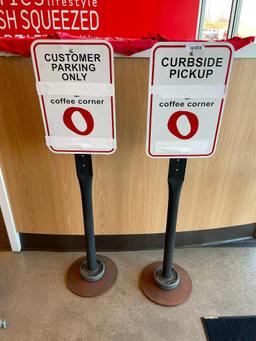 Two Sign Bases w/ Curbside Signs (Logos Covered w/ Tape)