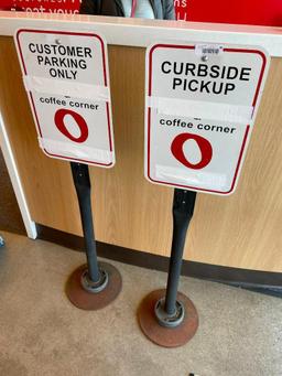 Two Sign Bases w/ Curbside Signs (Logos Covered w/ Tape)