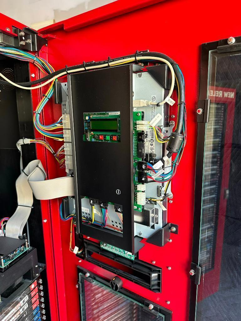 DVD Rental Machine Model S250, SN: S250-E865, 120v, Full of DVDs w/ Keys