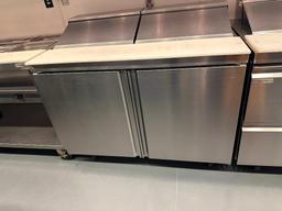 Delfield Welbilt 444SNP-12 2-Door, 2-Hinged Top Refrigerated Sandwich/Salad Prep Table on Mobile